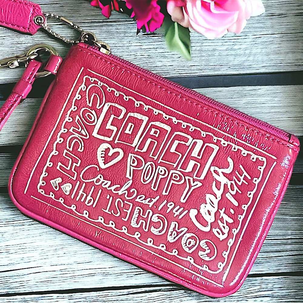 NEVER USED Coach Poppy pink zipper wristlet. Leopard interior. Pink hangtag.